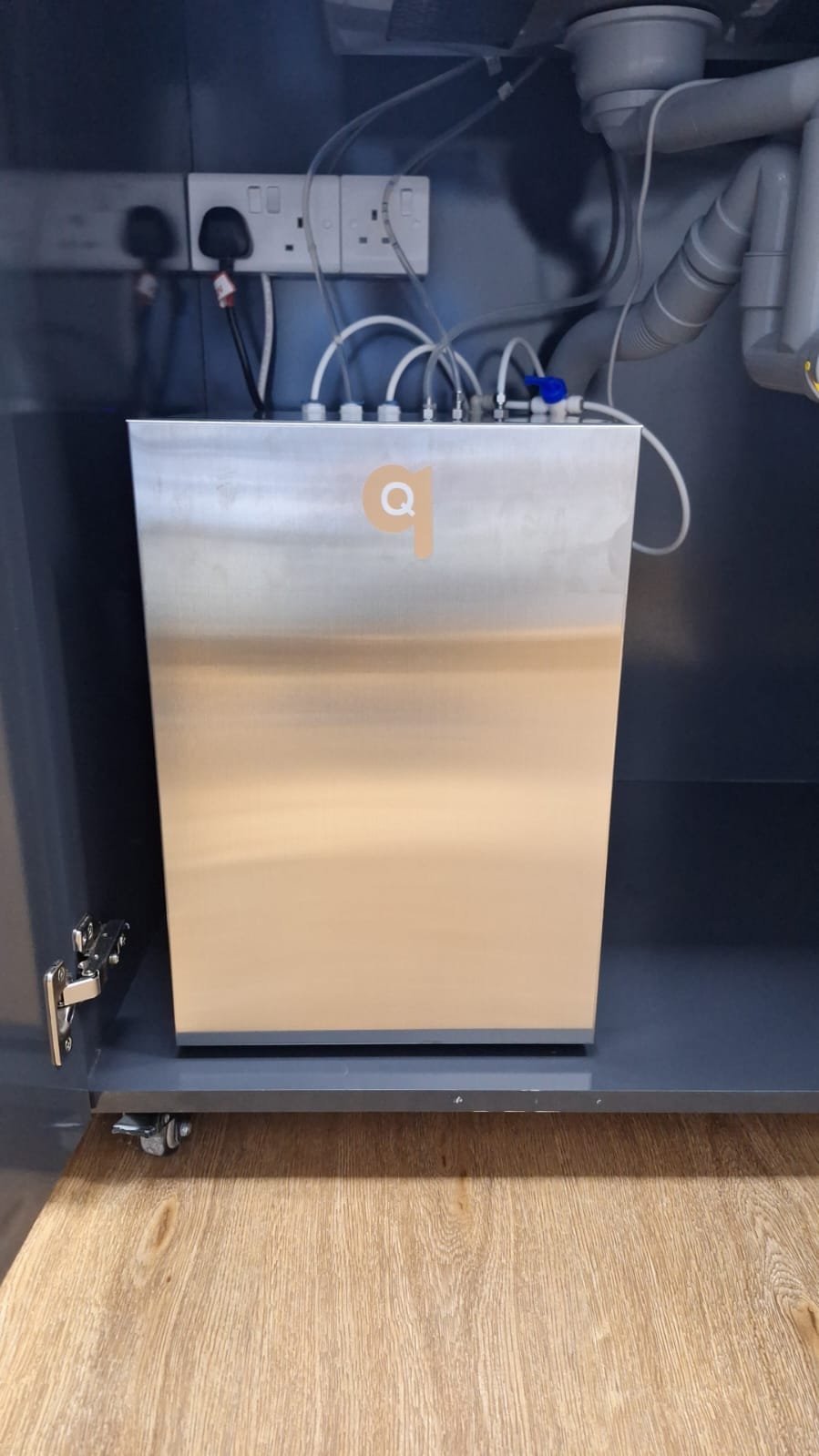 Quatreau The Q boiling chilled and sparkling water system installed under a sink in Oman