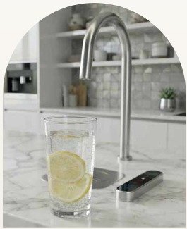 Sparkling water tap Oman - The Q serving chilled sparkling water at home